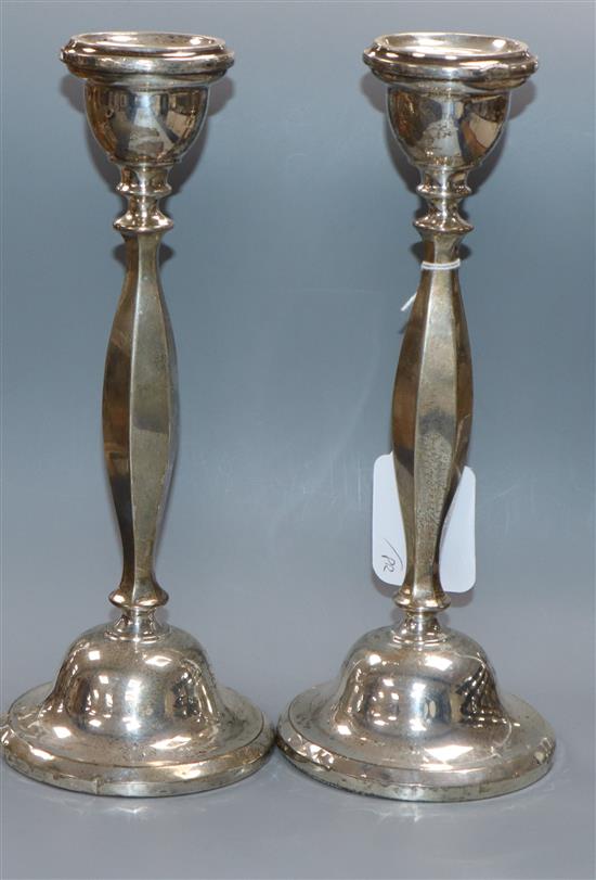 A pair of George V silver candlesticks, Birmingham, 1925, 24.1cm.